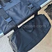 Heavy duty buckles on tailgate storage bag